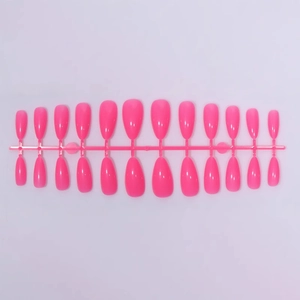 Vibrant hot pink long almond shaped press on nails set with 24 pieces on a rack