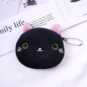 Detailed close-up of a black plush cat coin purse featuring a zipper and metal bead chain