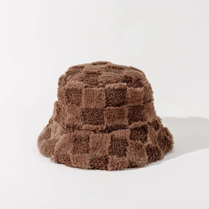 Detailed view of plush brown checkerboard bucket hat with soft faux fur texture