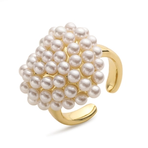 Detailed view of cluster pearl ring with gold-plated adjustable band for women
