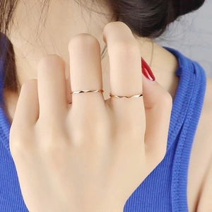 Rose gold 1mm diamond-faceted rings for women, stackable knuckle jewelry detail view
