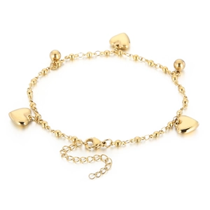 Golden beaded heart charm anklet made of titanium steel for women on a white background