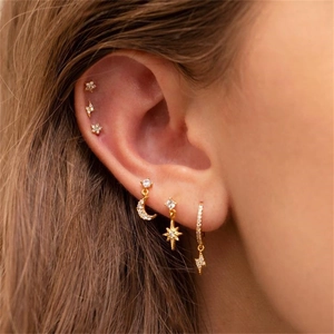 18K gold plated earring set featuring star, moon, and lightning zircon studs on ear