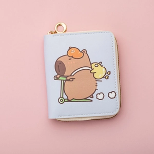 Detail of light blue Capybara coin purse with golden zipper and cartoon print