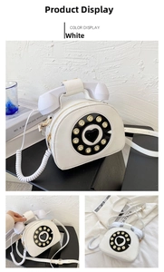Creative white vintage telephone cross-body bag with rotary dial and handset detail
