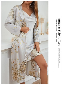 Close-up of elegant floral print loungewear set with silky satin texture and lace detail