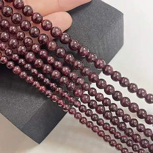 Perles naturelles de grenat rouge foncé poli en tailles variées pour bijoux DIY