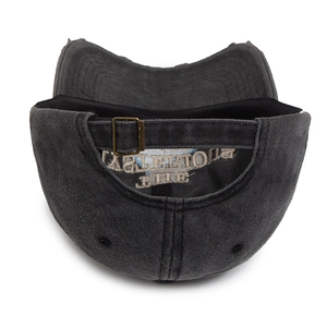 Vintage dark gray washed cotton baseball cap with adjustable bronze metal buckle back