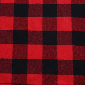 Macro texture of buffalo plaid fabric in red and black for Christmas table runners