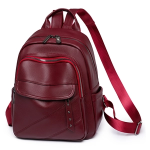 Premium burgundy PU leather backpack with lychee texture and multi-zipper compartments