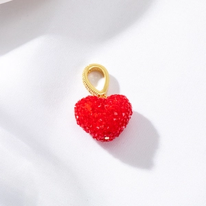 Sparkling red heart charm with gold ring attachment for DIY jewelry crafting and accessories
