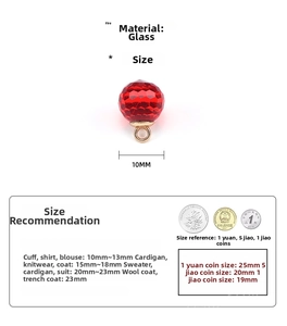 Detail of a 10mm red faceted glass button with gold loop for traditional clothing