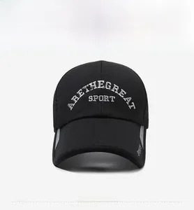 Detail of breathable mesh fabric and 3D lettering embroidery on the black baseball cap