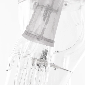 Detail of white mesh sleeve cuffs on long sleeve sexy top for women with sheer stitching
