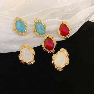 Vintage teardrop resin earrings set in red blue and white with gold plated trim