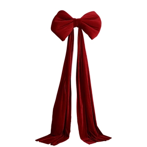 Giant burgundy velvet bow decoration with long ribbons for Christmas and weddings