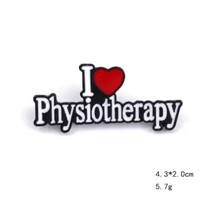 Detail view of I Love Physiotherapy enamel brooch with black finish and white letters
