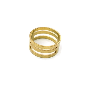 Macro shot of minimalist gold multilayer hollow ring with a sleek geometric structure