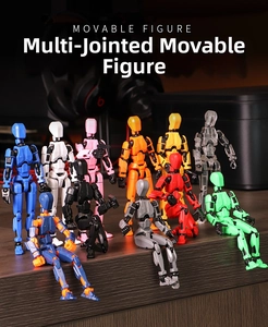 Detailed macro view of 3D printed movable figures with articulated joints on desk