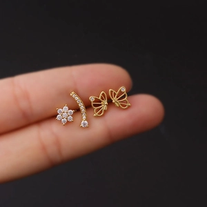 Gold stainless steel flower and butterfly stud earring set with clear zircon stones