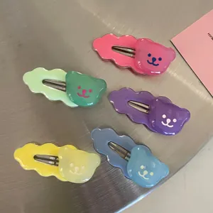 Set of five colorful acrylic bear hair clips with wavy edges in vibrant candy tones