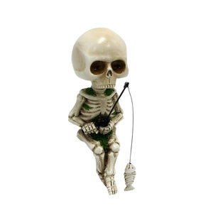 Detailed close-up of a fishing skeleton resin statue with green moss and a tiny fish detail