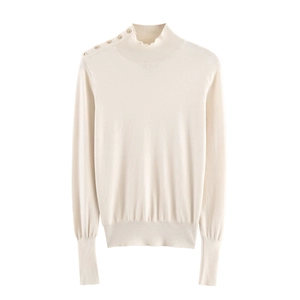 Women's mock neck knit sweater in cream white with gold shoulder buttons and wavy trim