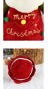 Detail of Christmas candy bag with golden Merry Christmas embroidery and secure zipper closure