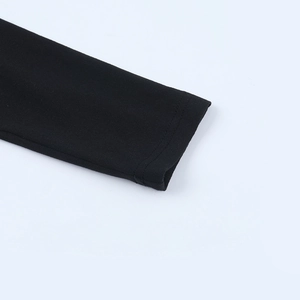 Close-up of black knitted sleeve cuff showing premium double-stitched sewing detail