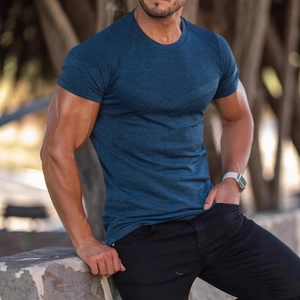 Men's slim fit dark blue athletic t-shirt with breathable mesh texture on model