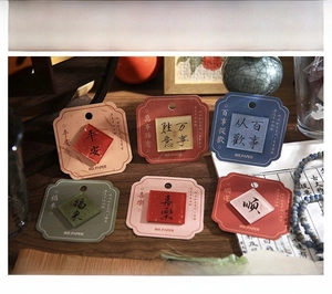 Macro detail of acrylic Chinese calligraphy fridge magnets with traditional auspicious blessings
