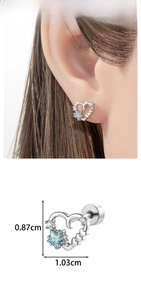 Detailed size view and ear styling of a hollow heart cartilage stud with blue star zircon