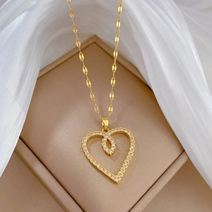 Elegant gold titanium necklace with double nested heart pendant inlaid with white zircons
