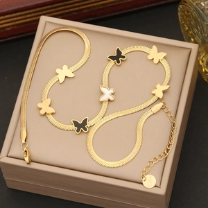 Elegant gold stainless steel snake chain necklace with butterfly pendants in a jewelry box
