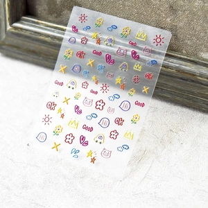 5D embossed nail stickers featuring colorful graffiti, flowers, hearts, and sun patterns