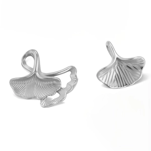 Macro view showing the detailed texture and metallic finish of stainless steel ginkgo leaf pendants