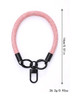 Pink patterned phone wrist strap measuring 14cm and weighing 26.2g with black metal clips