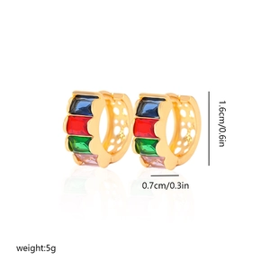 Detail view of gold-plated hoop earrings with multi-color stones and heart cutout patterns