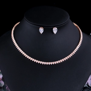 Elegant rose gold bridal jewelry set with pear-cut cubic zirconia necklace and earrings