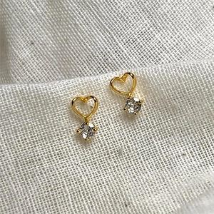 Elegant 925 sterling silver hollow heart earrings with sparkling zircon pendant