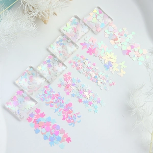 Iridescent star moon heart and butterfly shaped glitter flakes for nail art DIY crafts