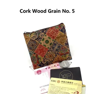 Detail of vintage cork coin purse with bohemian print, zipper, and key ring attachment