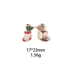 Detail of red and white Christmas stocking alloy pendant showing front and back views