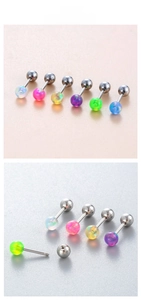Detailed view of 4mm synthetic opal ear studs with stainless steel screw-in ball design