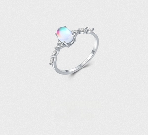 Close-up of S925 sterling silver moonstone ring with leaf-shaped side diamonds
