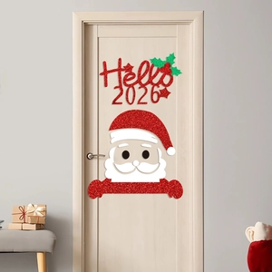 Adesivo per porta glitterato 'Hello 2026' e Babbo Natale su una porta di legno