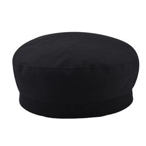 Detail of black cotton military flat cap showing clean stitching and stiff shape