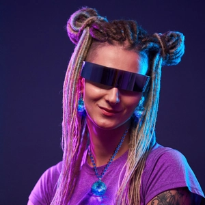 Cyberpunk neon necklace and ball earrings with light blue glow on futuristic model