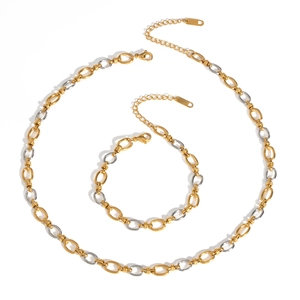 Parure collier et bracelet bicolores or et argent avec maillons ovales et fermoirs