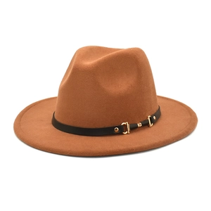 Detail of classic brown fedora wool hat with black leather belt and gold buckle decoration